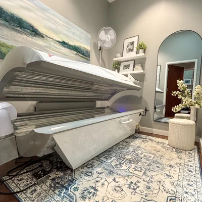 An open but unused red light therapy pod